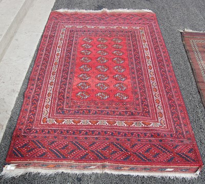 Lot 813 - A Persian Tekke type rug, the madder ground...