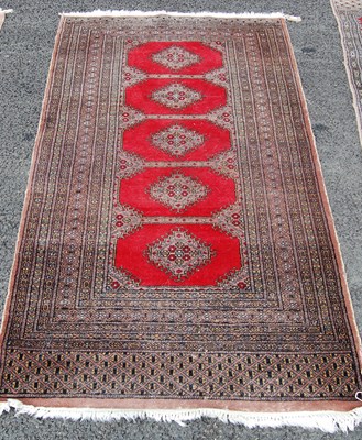 Lot 806 - A pair of Persian rugs, decorated with five...