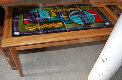 Lot 729 - A mid-century tile-top coffee table, together...