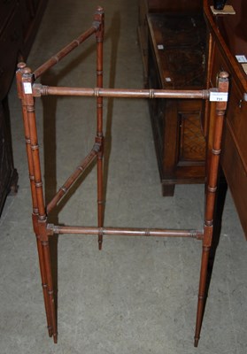Lot 731 - A faux bamboo mahogany folding towel rail
