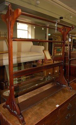 Lot 734 - A group of three assorted towel rails