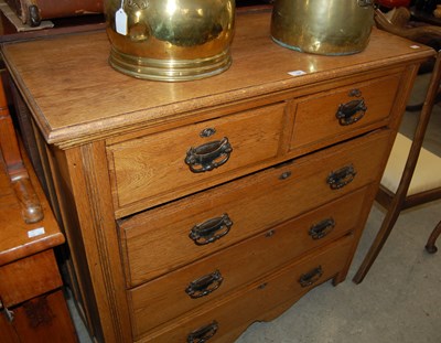 Lot 736 - An Art Nouveau oak chest of drawers comprising...