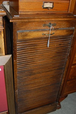 Lot 635 - A vintage oak stationery cabinet with tambour...