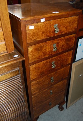 Lot 637 - An early 20th century walnut tall six drawer...