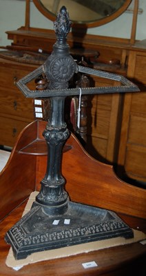 Lot 650 - A vintage black painted cast metal corner...