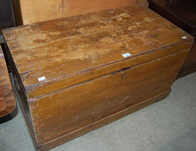 Lot 653 - A vintage pine kist with drop metal carry...