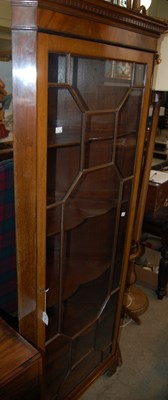 Lot 659 - A reproduction mahogany corner cupboard with...