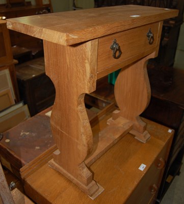 Lot 670 - A 20th century oak rectangular side table with...