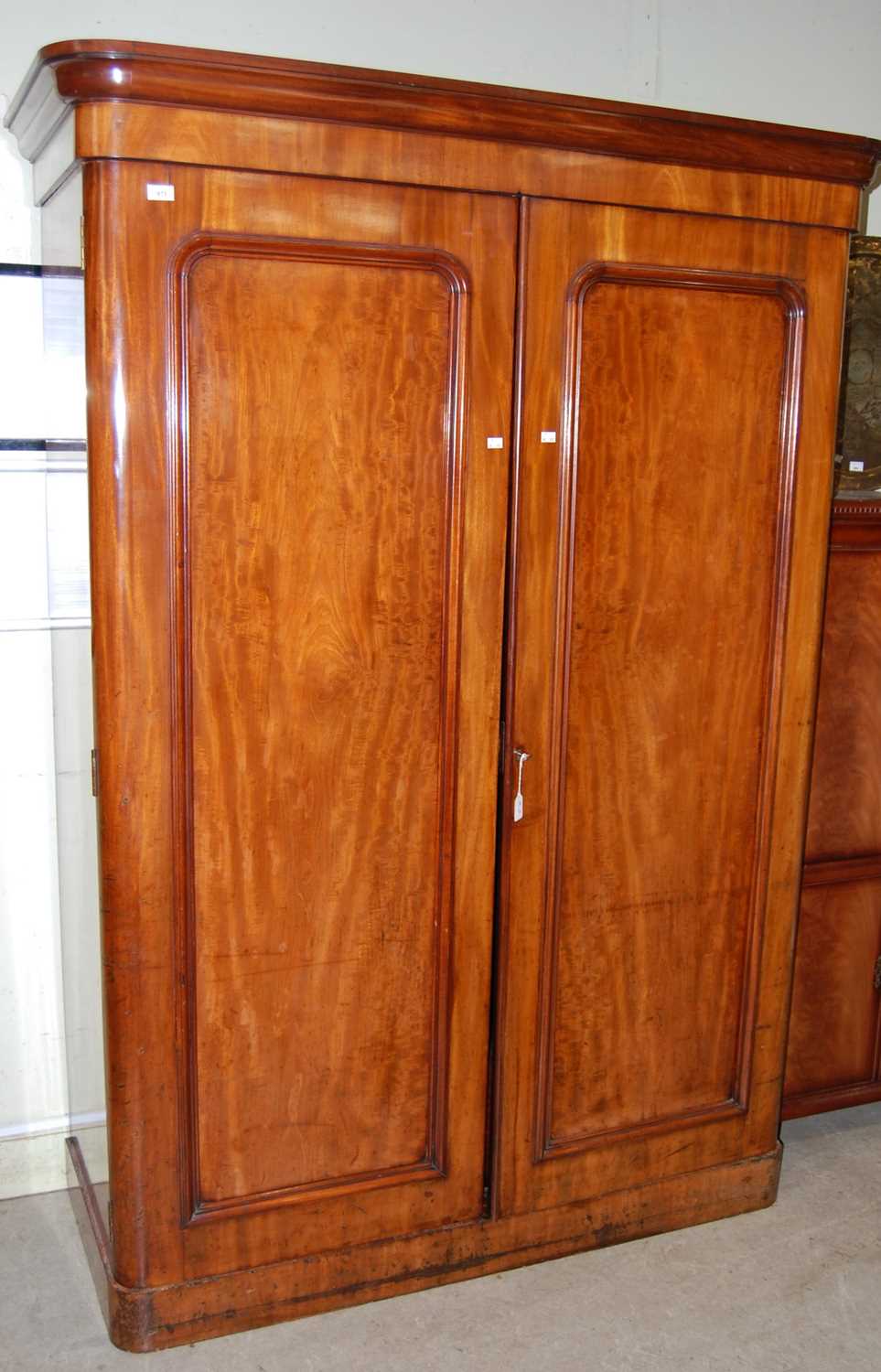 Lot 673 - A Victorian mahogany two door wardrobe