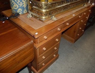 Lot 702 - A pine pedestal desk
