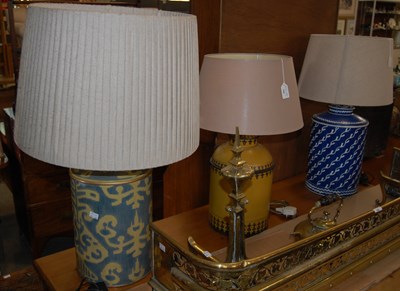 Lot 704 - A group of three contemporary tea tin table...
