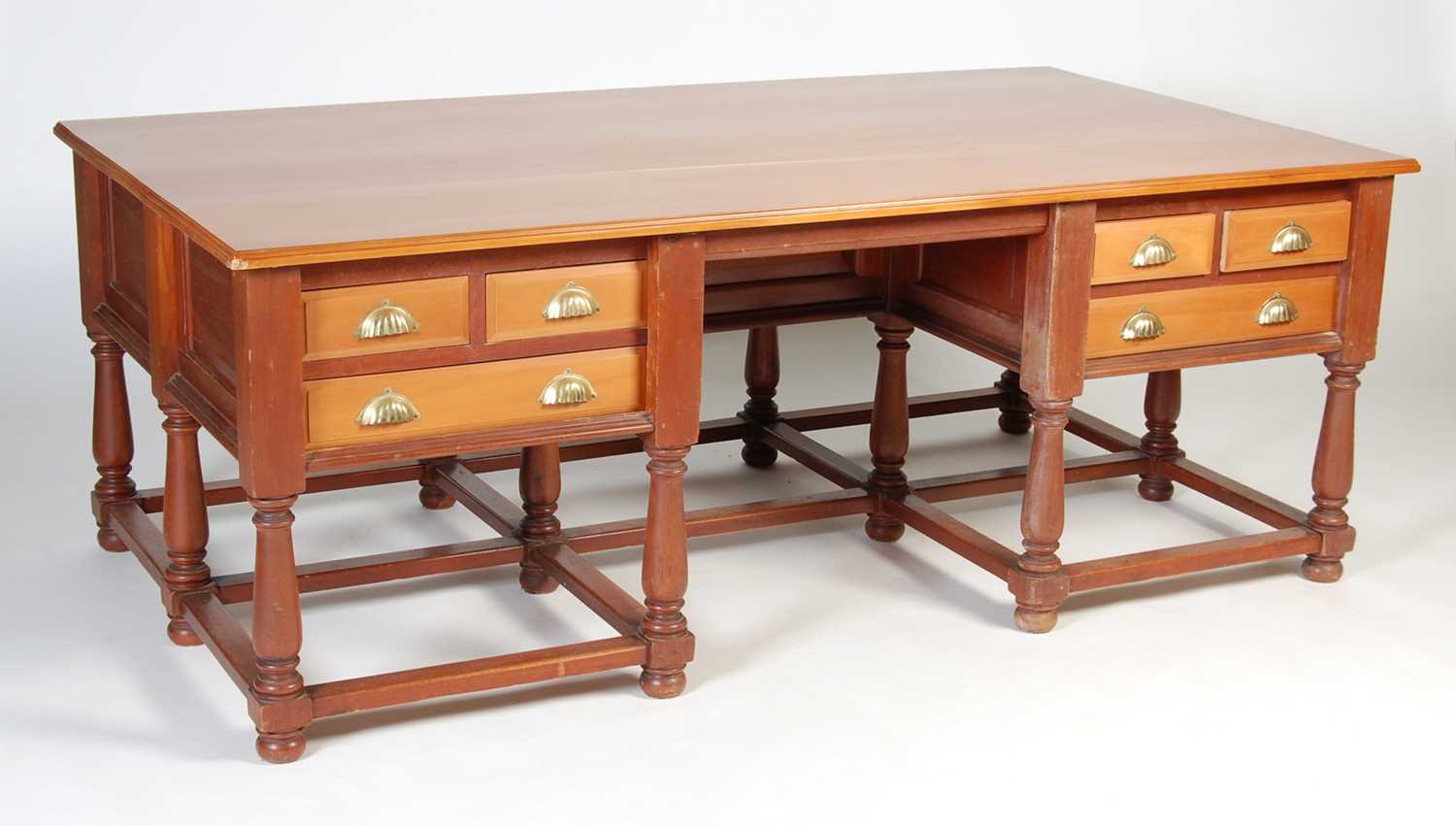 Lot 977 - A large pine Colonial style estate desk, 20th...