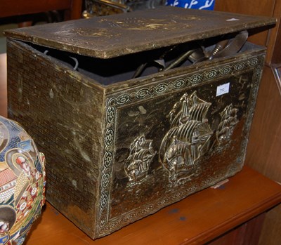 Lot 712 - An embossed brass rectangular fuel bin...
