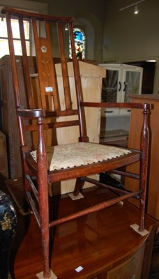 Lot 718 - An early 20th century Arts & Crafts stained...