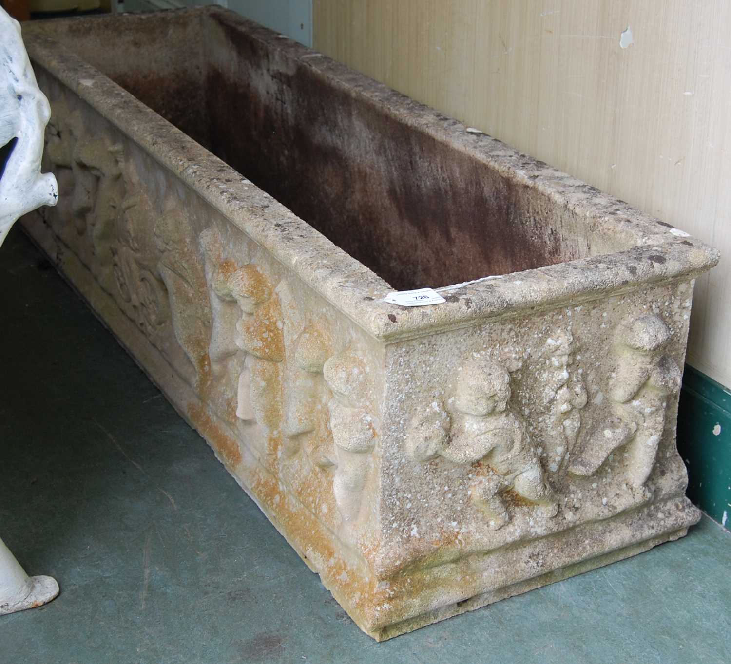 Lot 726 - A composite stone rectangular garden planter...
