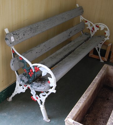 Lot 727 - A late 19th century cast iron garden bench...