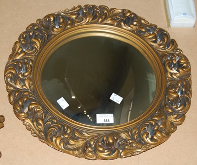 Lot 588 - A composite gilt framed circular convex wall...
