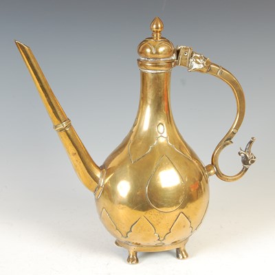 Lot 767 - An 18th century Indian bronze ewer, Mughal Empire