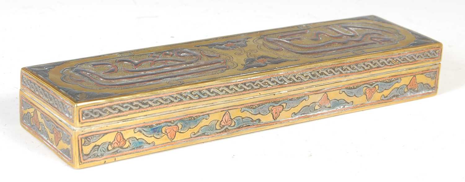 Lot 764 - A 19th century Persian brass, copper and white metal inlaid rectangular box