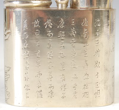 Lot 693 - A Chinese white metal opium pipe, late 19th/ early 20th century