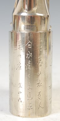 Lot 693 - A Chinese white metal opium pipe, late 19th/ early 20th century