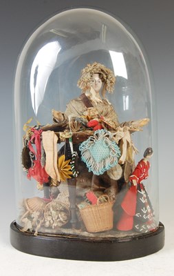 Lot 159 - A late 19th century 'Pedlar' doll mounted in a glass dome