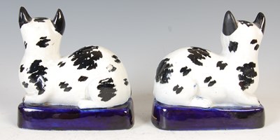 Lot 620 - A rare pair of 19th century Staffordshire pottery cats