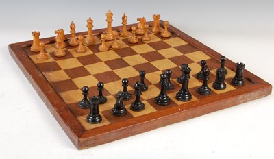 Lot 160 - A late 19th century boxwood and macassar ebony weighted chess set
