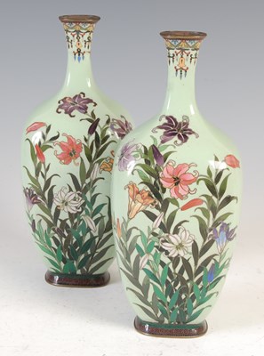 Lot 755 - A pair of Japanese apple green ground cloisonné square-shaped vases, late 19th/ early 20th century