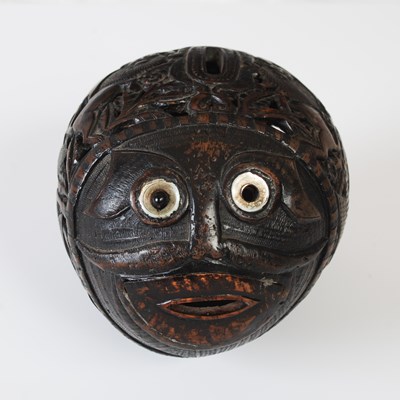 Lot 170 - A late 18th century Spanish Colonial carved and pierced coconut bugbear money box