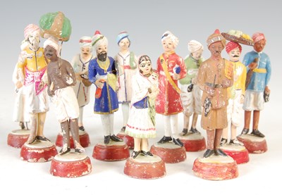 Lot 763 - A set of twelve Anglo-Indian Company School painted clay figures