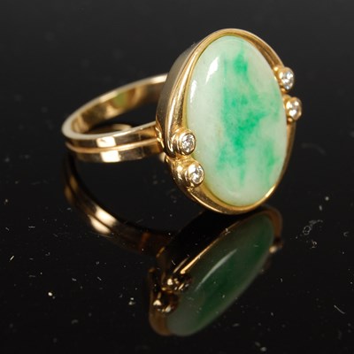 Lot 509 - Bucherer, a yellow metal jade and diamond set ring