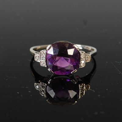 Lot 502 - A mid 20th century Art Deco style white metal, amethyst and diamond set cocktail ring