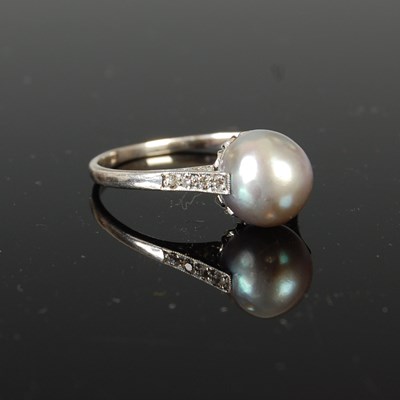 Lot 499 - A mid 20th century white metal, pearl and diamond cocktail ring