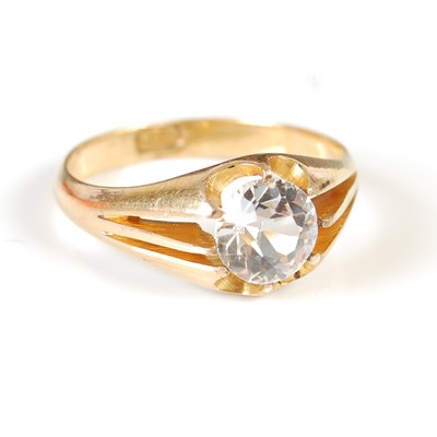 Lot 479 - A late 19th century yellow metal and paste set solitaire ring