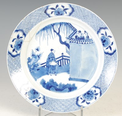 Lot 648 - A Chinese porcelain blue and white plate, Qing Dynasty, probably Kangxi