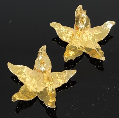 Lot 472 - A pair of 20th century Yemeni high carat yellow metal starfish shaped earrings