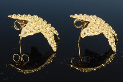 Lot 472 - A pair of 20th century Yemeni high carat yellow metal starfish shaped earrings