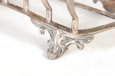 Lot 412 - A Victorian silver seven bar toast rack, London, 1856, makers mark of CTF. over GF.