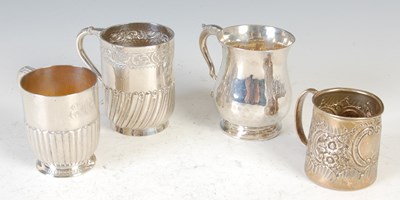 Lot 425 - A group of four silver assorted late 19th/ early 20th century christening mugs