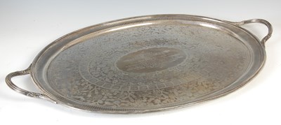 Lot 443 - A large Victorian silver twin handled oval shaped tray, London, 1886