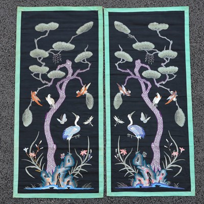 Lot 705 - A pair of Chinese black ground silk rectangular wall hangings, Qing Dynasty