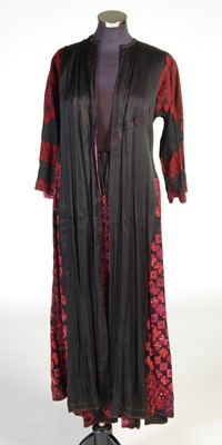 Lot 187 - A vintage Syrian, Aleppo, black ground embroidered jacket and skirt