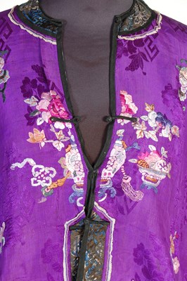 Lot 708 - A Chinese purple ground embroidered ladies silk jacket and matching pantalons