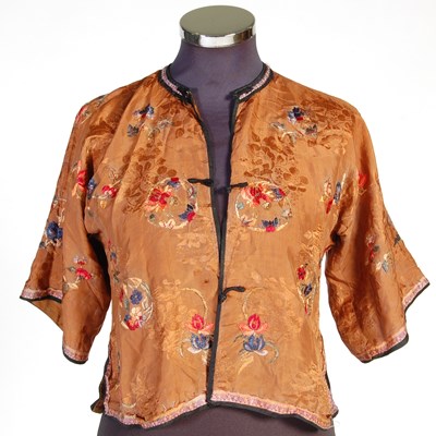 Lot 708 - A Chinese purple ground embroidered ladies silk jacket and matching pantalons
