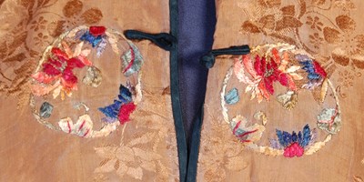 Lot 708 - A Chinese purple ground embroidered ladies silk jacket and matching pantalons