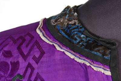 Lot 708 - A Chinese purple ground embroidered ladies silk jacket and matching pantalons