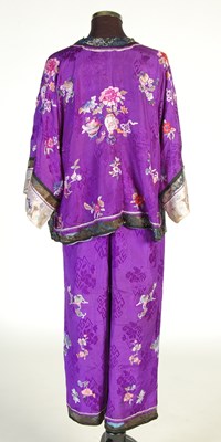 Lot 708 - A Chinese purple ground embroidered ladies silk jacket and matching pantalons