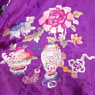 Lot 708 - A Chinese purple ground embroidered ladies silk jacket and matching pantalons