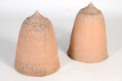 Lot 115 - A pair of terracotta rhubarb forcers and covers
